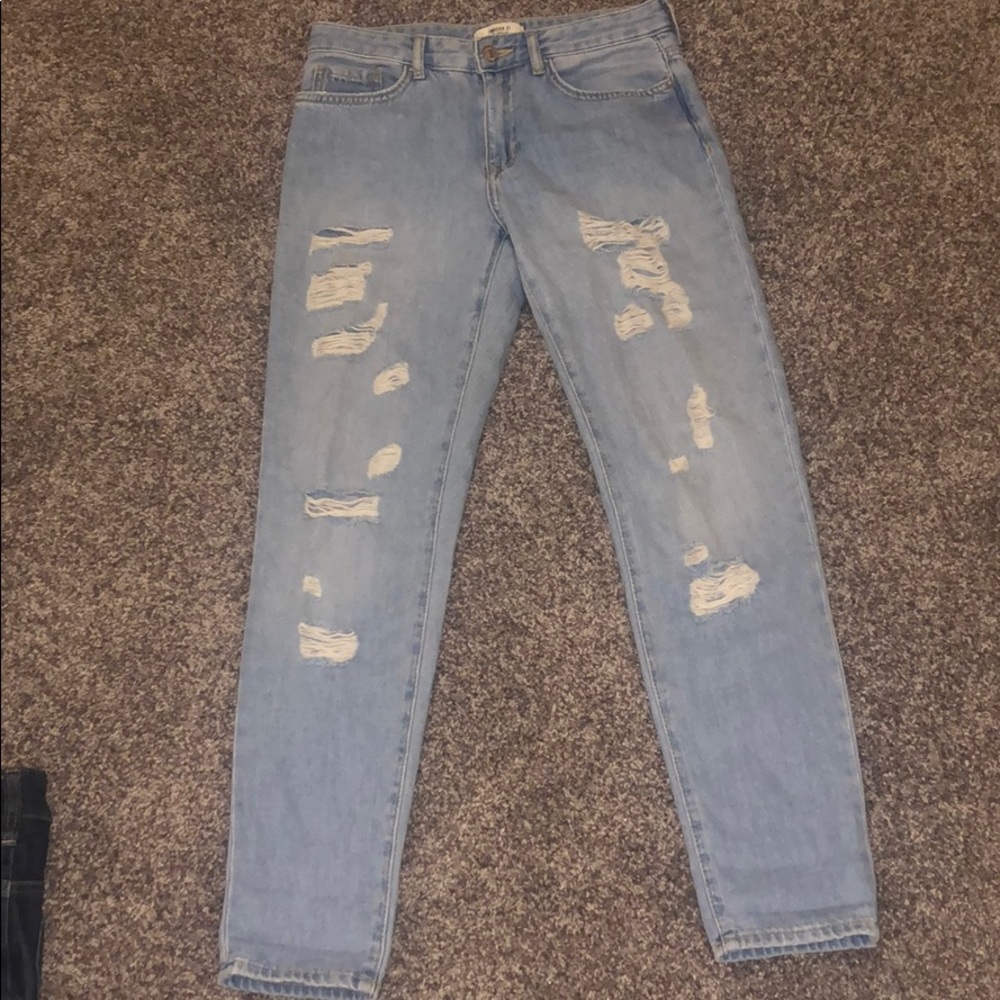 High-waisted ripped boyfriend jeans